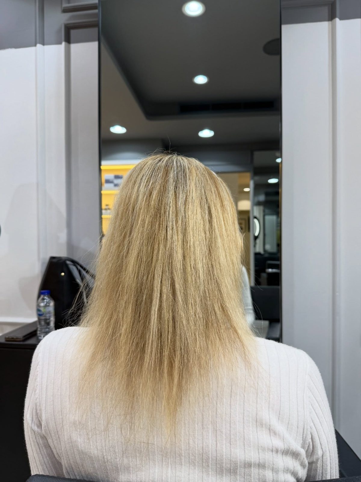 Fine blonde hair before extensions